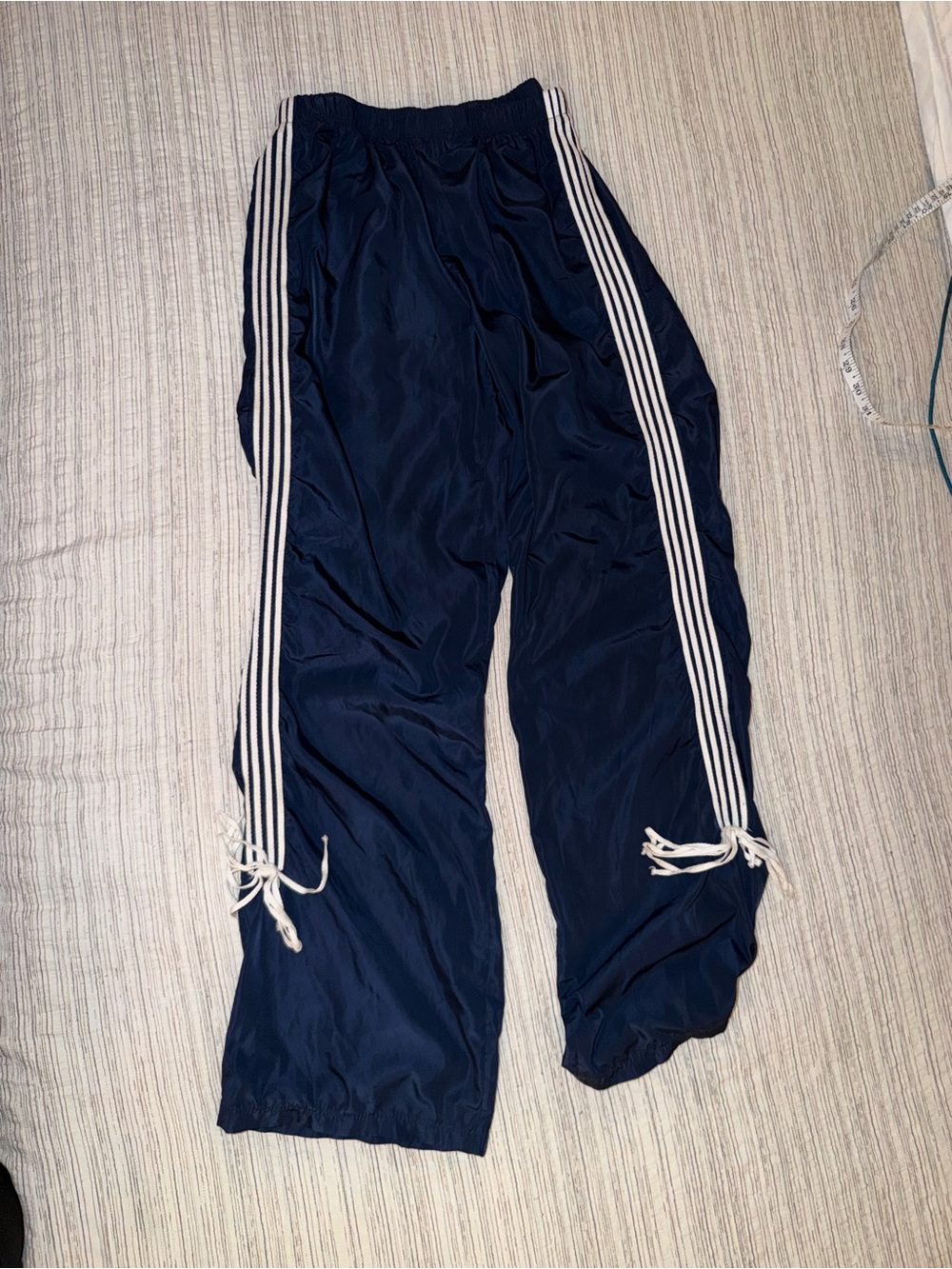 Edikted Navy Track Pants with bows 90’s music video style